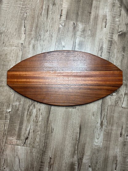 Walnut and mahogany football shaped cutting/charcuterie board